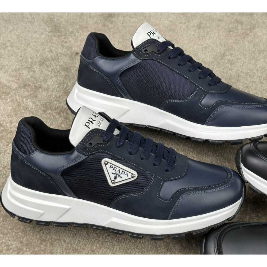 Prada Leather And Re-Nylon Sneakers - DopestKickz