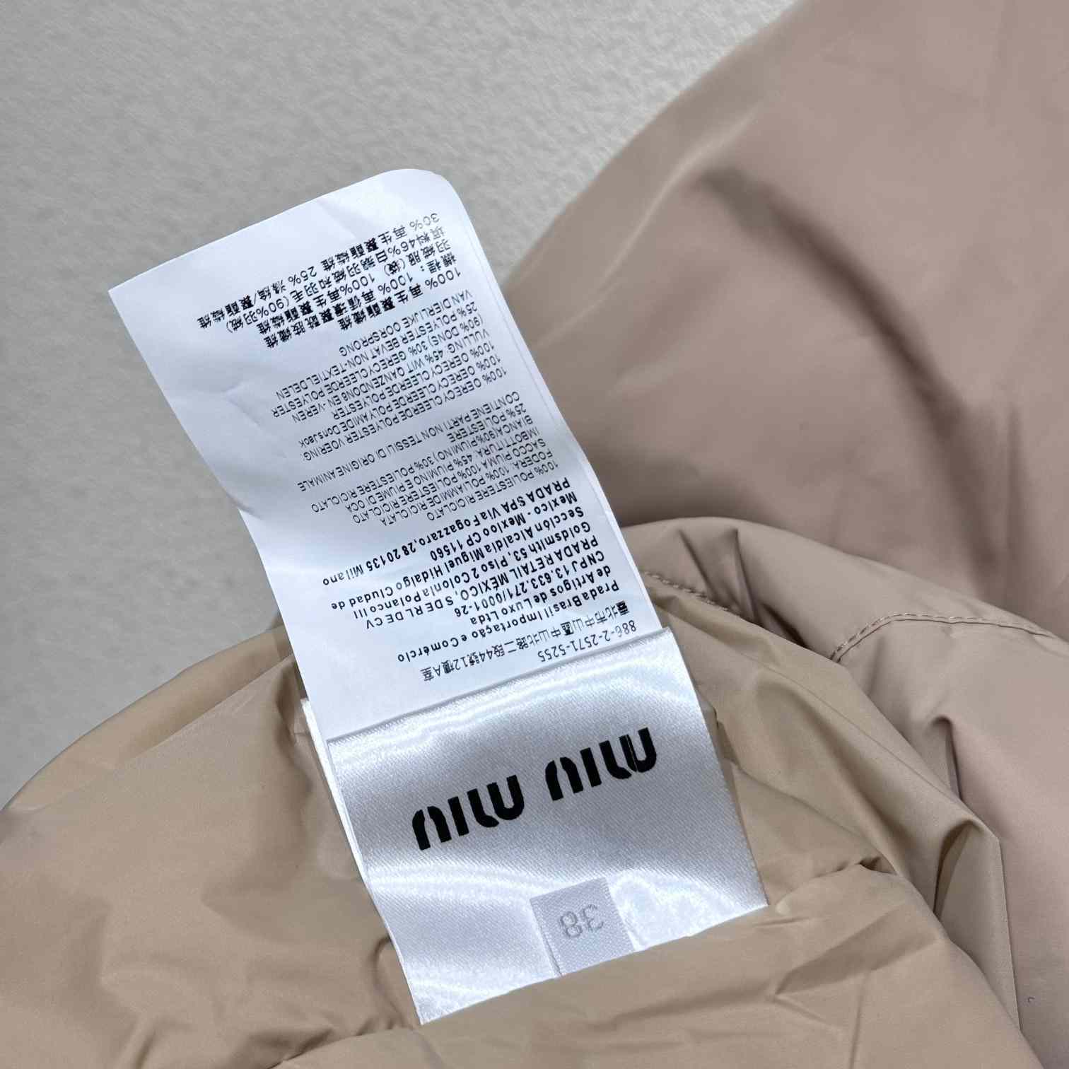 Miu Miu Drawstring Hooded Down Jacket - DopestKickz